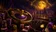 A cinematic scene featuring a glowing roulette wheel, floating poker chips, and vibrant dice against a mysterious dark backgr